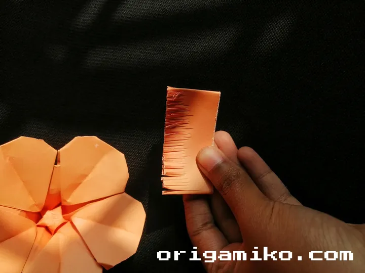 Origami hibiscus flower step 6 (c)