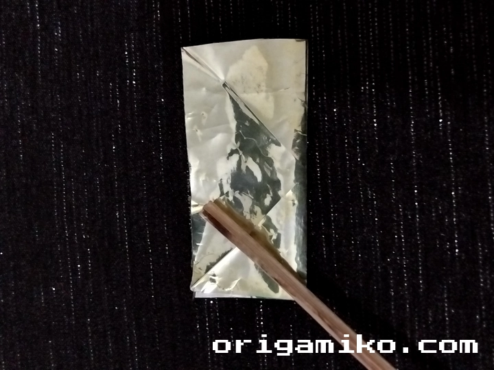 Gum wrapper origami crane step 2 c