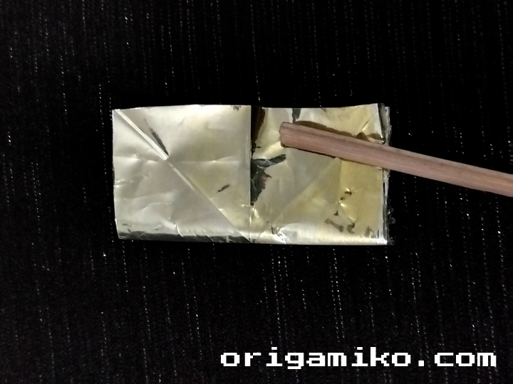 Gum wrapper origami crane step 2 d