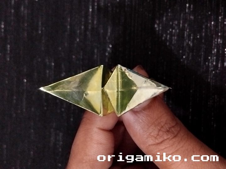 Gum wrapper origami crane step 4 a