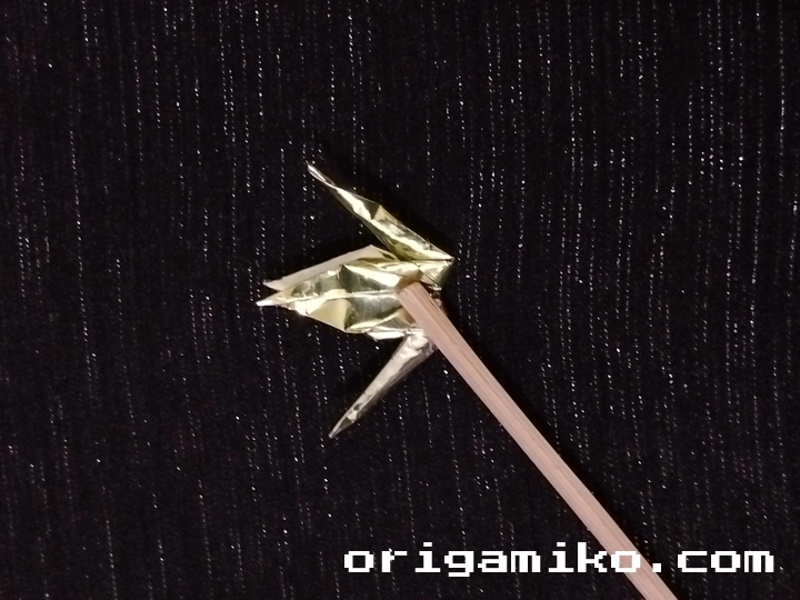 Gum wrapper origami crane step 5